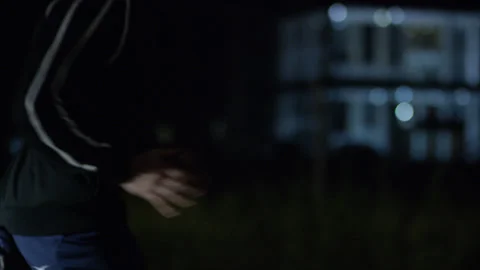 Night runner on a city streets Stock Footage 137359333