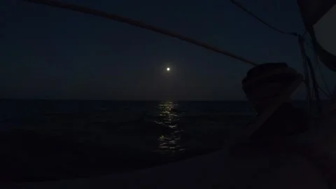 Night Sailing with Full Moon over the Ocean Stock Footage 172454933