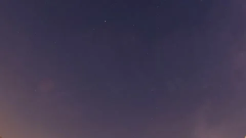Night scene dark sky with starry stars turned to morning sunrise blue sky Stock Footage 149805528