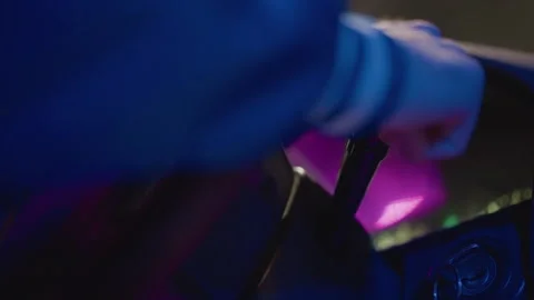 Night scene inside vehicle with neon lights and city reflections, Interior view Stock Footage 327354792