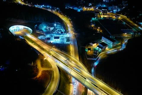 Night scene Intersection cross road with vehicle movement aerial view by dron Stock Photos