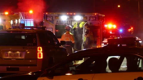 Night scene of paramedics at work on streets of Toronto, Canada. Static 動画素材 150961080