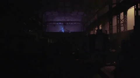 Night scene from the techno party in the old welding repair factory Stock-Footage 147270634