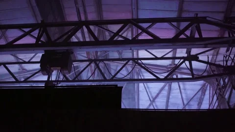 Night scene from the techno party in the old welding repair factory Stock-Footage 147270653