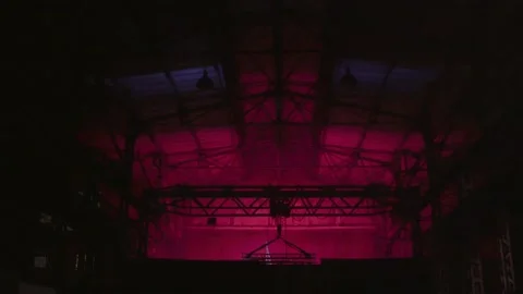 Night scene from the techno party in the old welding repair factory Stock Footage 147270661