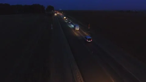 Night shift work .48 hours. Asphalt paver, roller and truck at the repair site Stock Footage 229907740