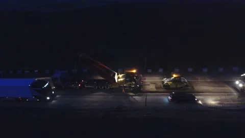 Night shift work .48 hours. Asphalt paver, roller and truck at the repair site Stock Footage 230116583