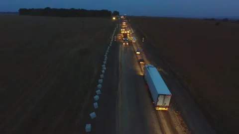 Night shift work .48 hours. Asphalt paver, roller and truck at the repair site Stock Footage 230548837