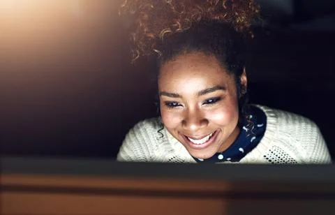 On night shift you make more money by the hour. Shot of a young businesswoman Stock Photos