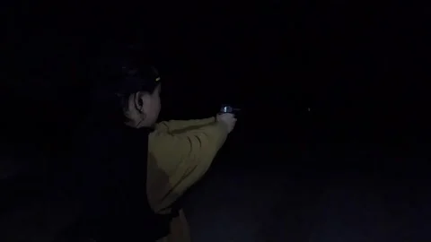 Night shoot with large muzzle flash Stock Footage 305394245