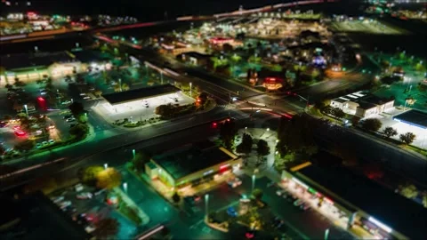 Night Shopping Small Town Hyperlapse effect at dark with miniature car Video stock 144225039
