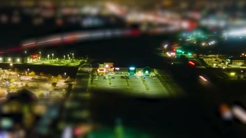 Night Shopping Small Town Hyperlapse tilt shift effect at dark Video stock 144648868