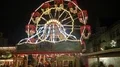 Night shot Brunswick Christmas market with illuminated antique ferris wheel 4k or 4k+ Resolution