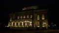 Night shot city street scenery illuminated theater building 4k or 4k+ Resolution