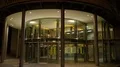 Night shot city street scenery illuminated modern theater building 4k or 4k+ Resolution
