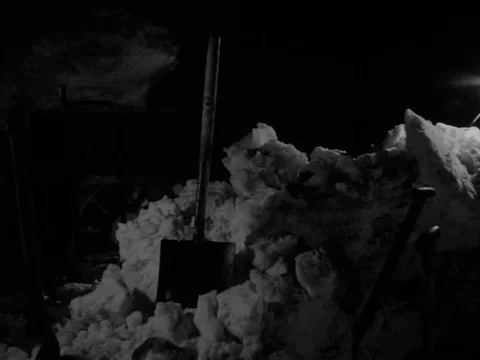 Night shot of freight train rescue from snow drift, UK 1955 Video stock 133270582