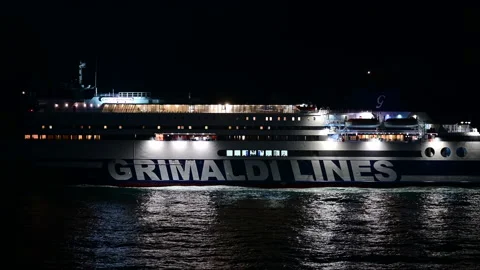 Night shot of Grimald Ferry . Grimaldi Group is a multinational logistics Group Vídeo Stock 176458708