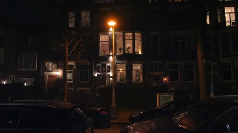 Night shot of house in upper class area, seen from street. Amsterdam. Wide shot. Stock Footage 148271156