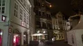 Night shot inner city people sitting outdoor at cafe 4k or 4k+ Resolution