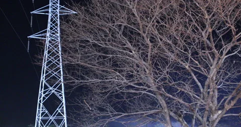Night shot of Power poll on mountain Odisha India Stock Footage 303955720