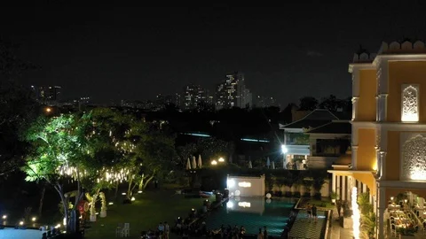 Night side view of a house in theme park in district7 Stock Footage 105105333