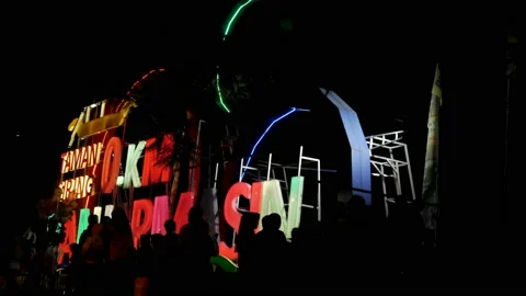 Night silhouette of people walking in the front of Zero Kilometre sign Stock Footage 141297075
