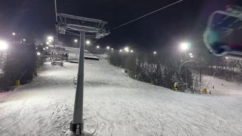 Night Skiing, on a lift Stock Footage 285432661