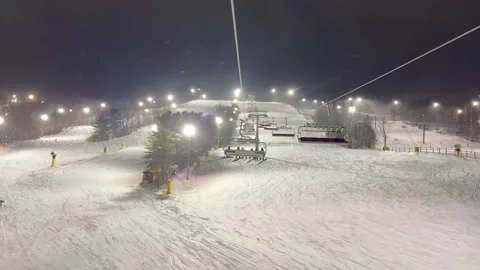 Night Skiing, on a lift Stock Footage 285432808