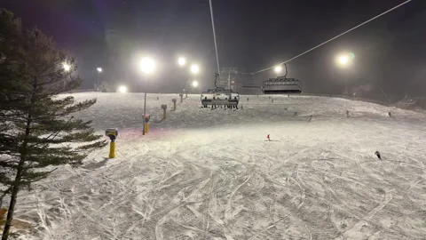 Night Skiing, on a lift Stock Footage 285432828