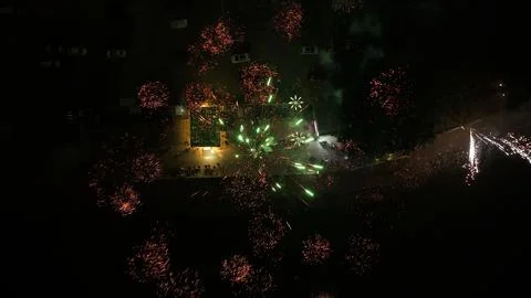 Night sky with beautiful firework background. Firecracker pyrotechnics show. Stock Photos