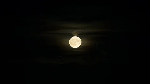 Night sky with full moon in the clouds, time lapse Stock Footage 107980791