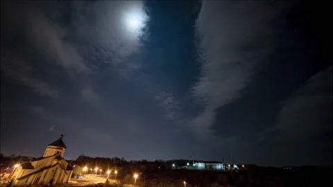 Night sky with full moon in the clouds, time lapse 4K Stock Footage 131006498