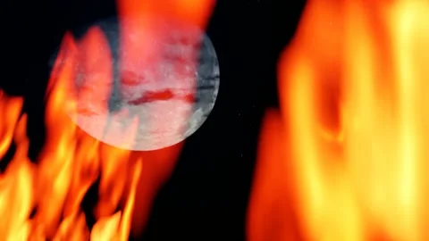 Night sky with a huge moon view through a bonfire. Stock Footage 139405709