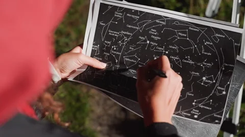 Night sky mapping by scientist. Outdoor sky chart created by astronomer Stock Footage 328054842