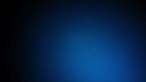 Night sky presenting a gradient of dark blue and black with numerous stars Stock Footage 343411552