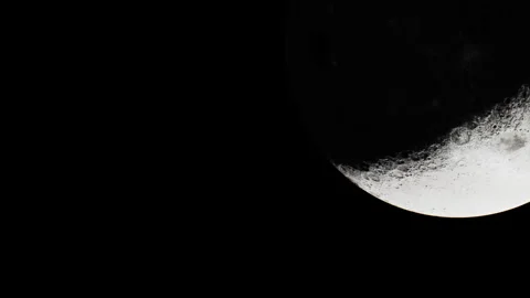 Night sky shows crescent moon with clear outline and craters visible Stock Footage 343511644