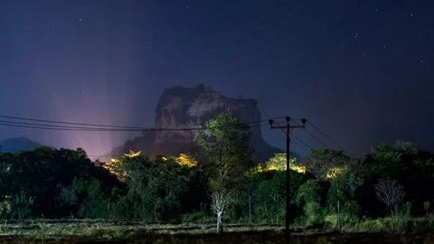 Night sky time lapse over Sigiriya rock in Sri Lanka Stock Footage 106487859