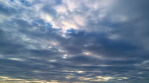 Night Sky timelapse. Moving clouds and sunset. Clouds float through the evening Stock Footage 302741734