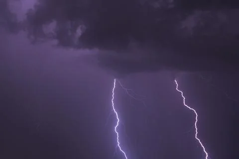 Night sky with two strokes of lightning Stock Photos
