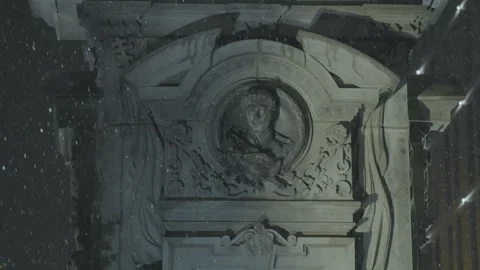 Night snowfall over a monument to Vasil Levski in Sofia city Stock Footage 258220937