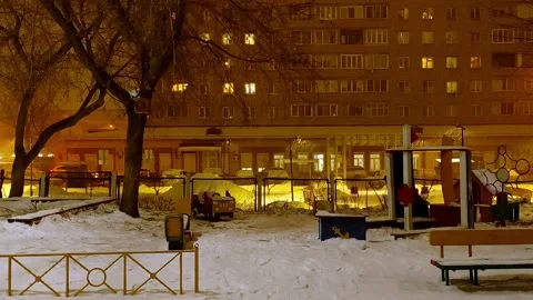 Night snowfall, under the light of lanterns Video stock 260992610