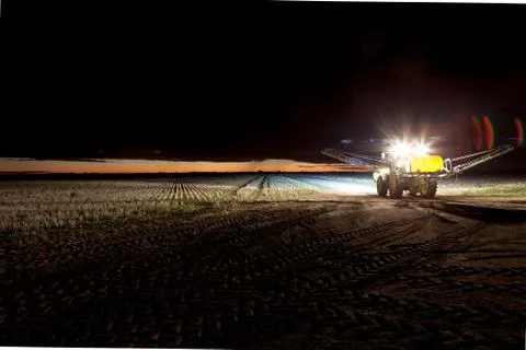 Night spraying. Stock Photos