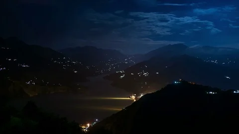 Night storm with lightning over mountain river valley in Himalaya Stock Footage 82583062