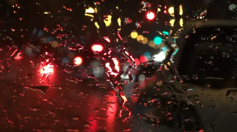 Night Storm Road - 01 - Traffic Lights In Wet Windshield Stock Footage