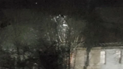 Night Street Lamp in Snowfall. Quick Shot. Snow falls at Night. Stock Footage 230056631