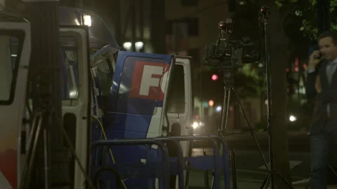 Night Television News Broadcast Setup on City Street 스톡 동영상 343094552