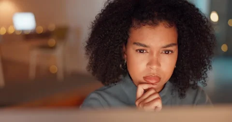 Night, thinking and computer with black woman in office for research proposal 動画素材 235982074