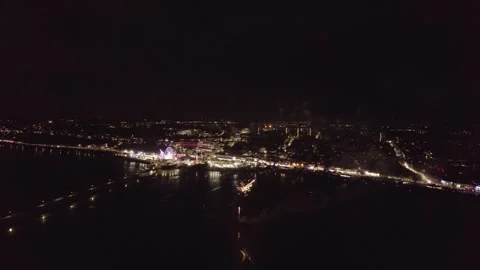 Night time aerial shot captured in Southend showing seafront fireworks Stock Footage 252489367