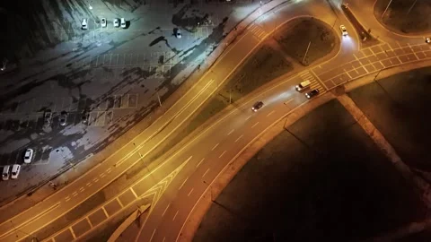 Night time aerial view of a beach and a city at night Stock Footage 268917535
