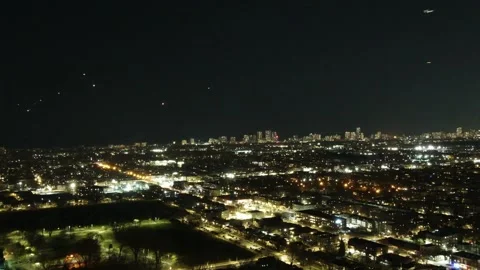 Night-time Air Traffic Approaching O'Hare with Chicago Skyline Stock Footage 314521725